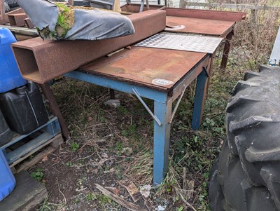 Lot 490 - Two large welded steel and plywood top benches,...