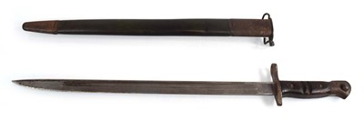 Lot 138 - A 1913-Pattern Remington bayonet with scabbard,...