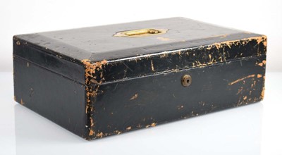 Lot 140 - A George V black tooled leather despatch box...