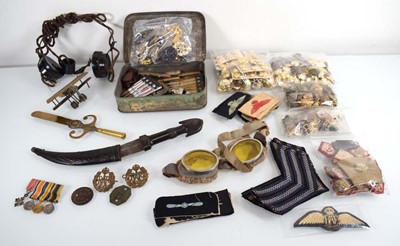 Lot 143 - A group of militaria including a trench art...