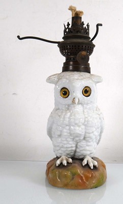 Lot 326 - An early 20th century novelty oil lamp...