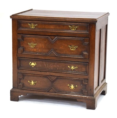 Lot 1 - An 18th century Georgian oak chest of four...