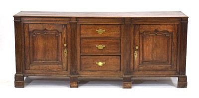 Lot 2 - An 18th century and later oak dresser base,...