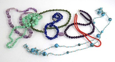 Lot 595 - A group of beaded necklaces including a lapis...