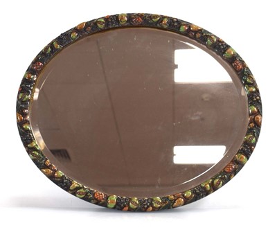 Lot 4 - A late 19th century oval mirror, the...