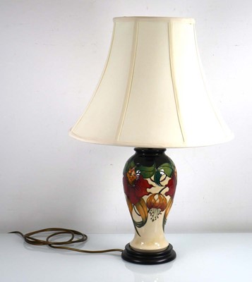 Lot 340 - A Moorcroft table lamp of baluster form...