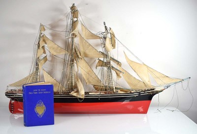 Lot 86 - A model of a three-master sailing ship, 111 x...