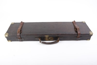 Lot 50 - Leather gun case monogrammed E.A.G., red baize...
