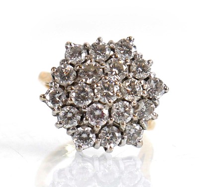 Lot 598 - An 18ct yellow gold cluster ring set nineteen...