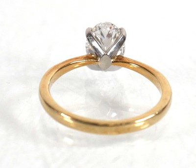 Lot 609 - A yellow metal ring set oval lab grown diamond...