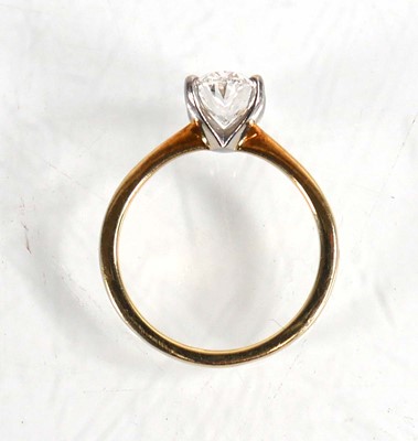 Lot 609 - A yellow metal ring set oval lab grown diamond...