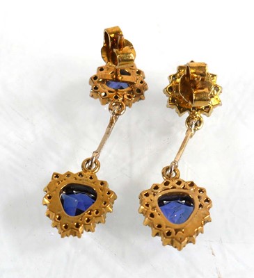 Lot 625 - A pair of yellow metal ear pendants, each set...