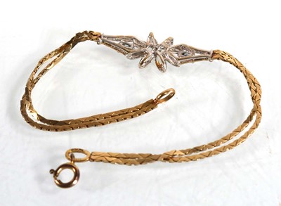 Lot 630 - A 9ct yellow gold double link bracelet with...