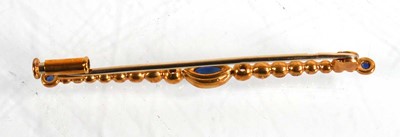 Lot 636 - An 18ct yellow gold bar brooch set marquise...