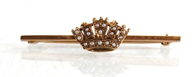 Lot 638 - A 9ct yellow gold coronet bar brooch set seed...