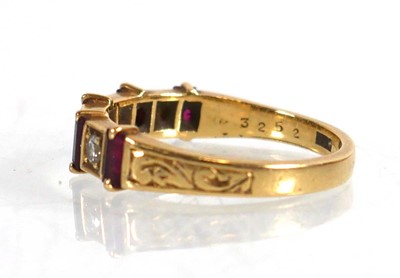 Lot 646 - An 18ct yellow gold half eternity ring set...