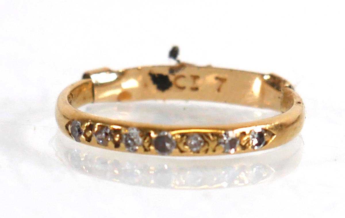 Lot 648 - An 18ct yellow gold half eternity ring set...