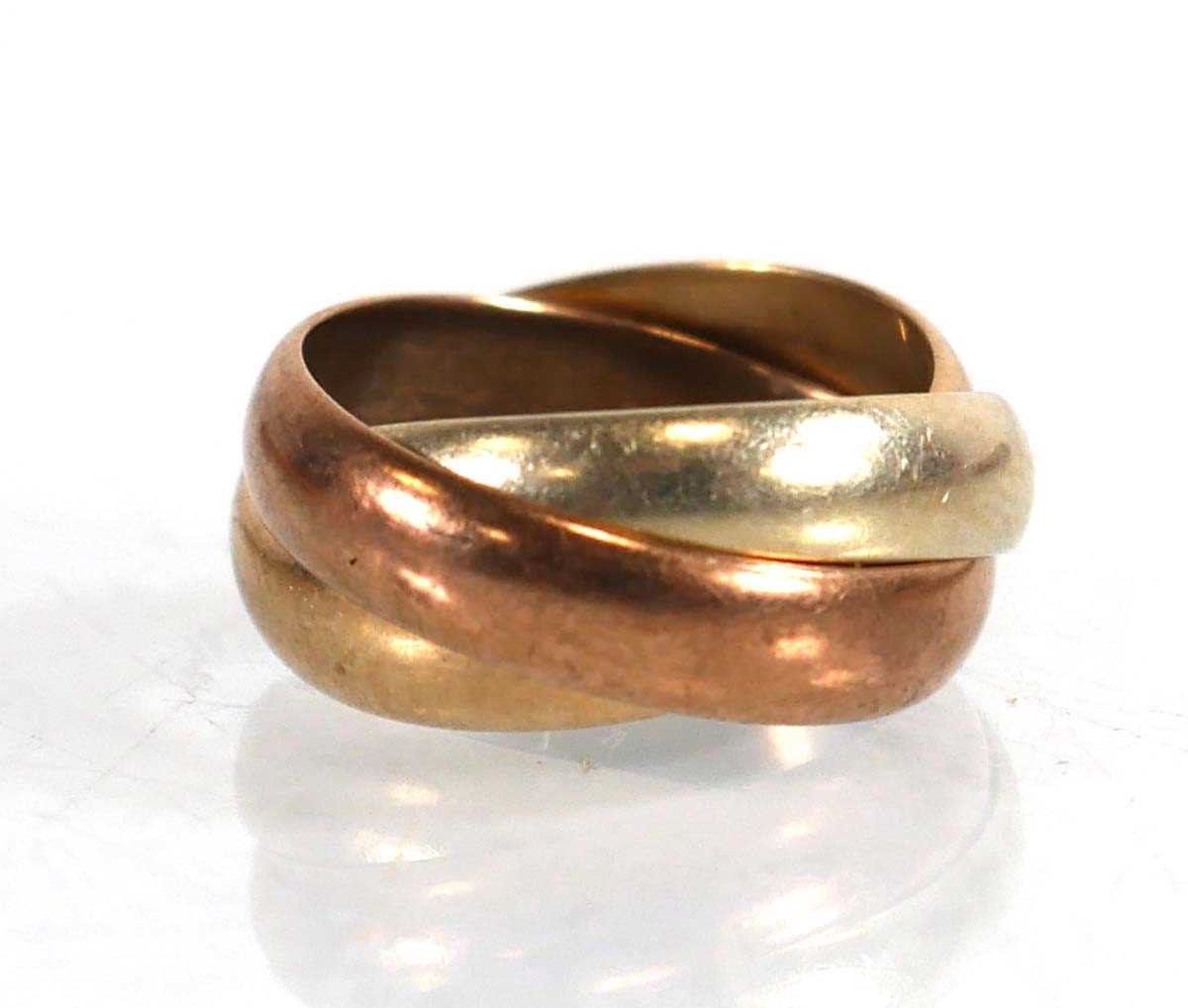 Lot 649 - A 9ct tri-colour gold triple band ring, ring...