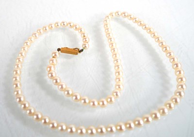 Lot 657 - A single strand cultured pearl necklace with...