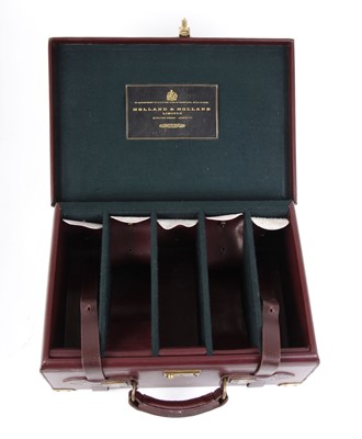 Lot 10 - Red leather Holland & Holland cartridge...
