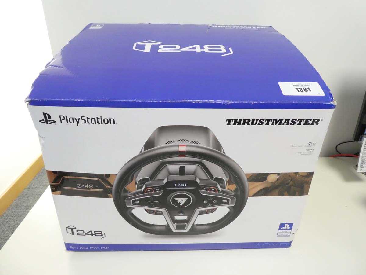 Lot Thrustmaster T248 racing wheel and pedal set...