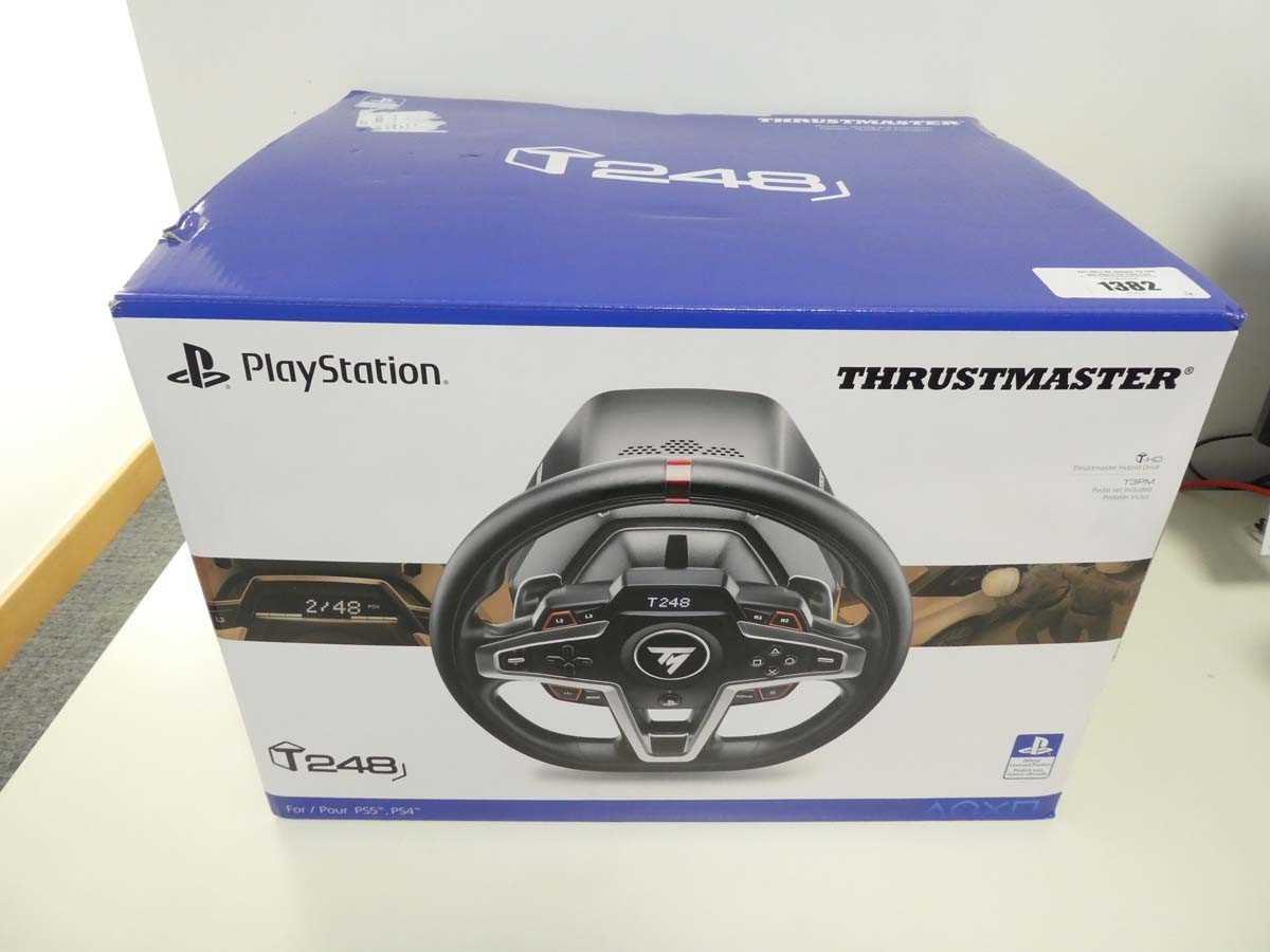 Lot Thrustmaster T248 racing wheel and pedal set...