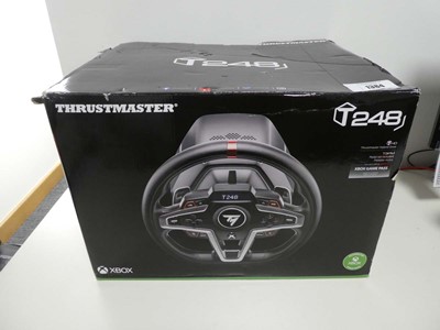 Lot Thrustmaster T248 racing wheel and pedal set...