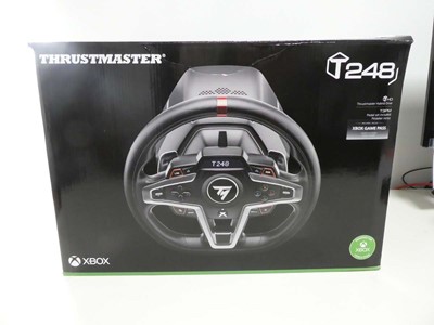 Lot Thrustmaster T248 racing wheel and pedal set...