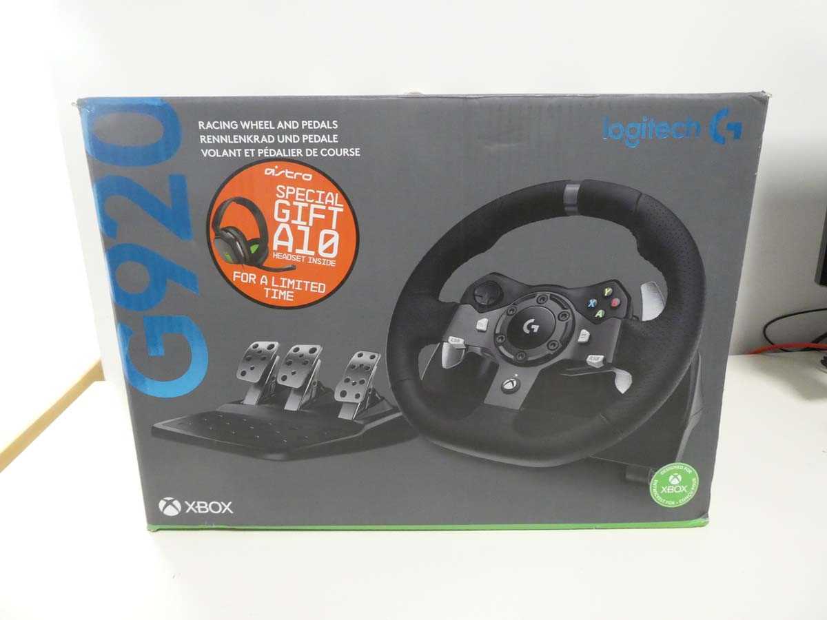 Lot Logitech G920 racing wheel and pedal set for...