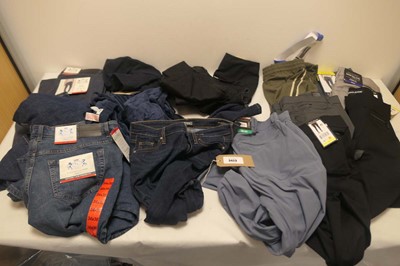 Lot A bag containing 15 pairs of trousers to...