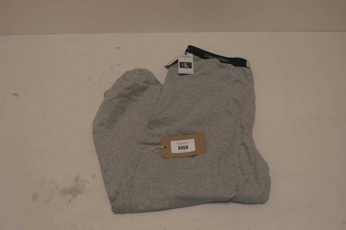 Lot 3454 - A bag containing 10 Calvin Klein joggers