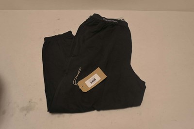 Lot A bag containing 10 Calvin Klein joggers