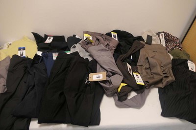 Lot A bag containing 20 pairs of trousers to...