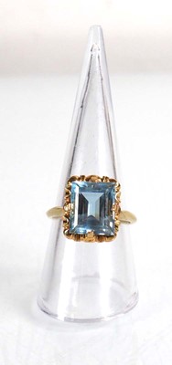 Lot 674 - A 14ct yellow gold ring set rectangular cut...