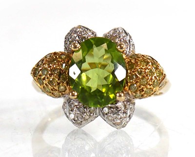 Lot 675 - A 14ct yellow gold ring set oval green stone...