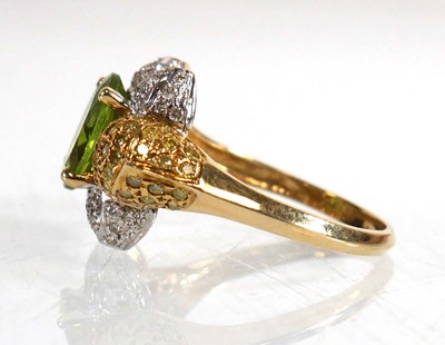 Lot 675 - A 14ct yellow gold ring set oval green stone...