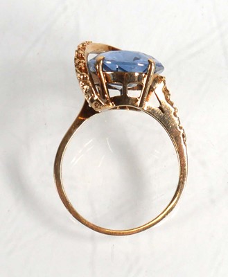 Lot 677 - A 10ct yellow gold ring set marquise cut pale...