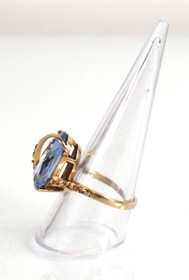 Lot 677 - A 10ct yellow gold ring set marquise cut pale...