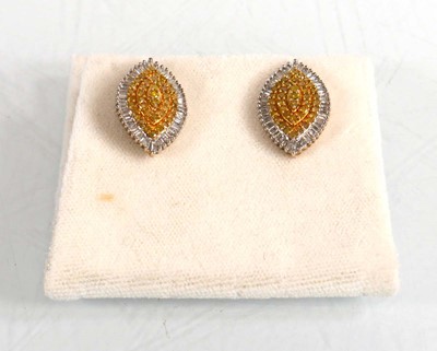 Lot 678 - A pair of 9ct yellow gold ear studs of...