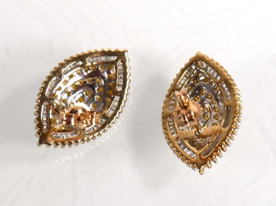 Lot 678 - A pair of 9ct yellow gold ear studs of...