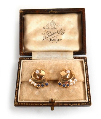 Lot 680 - A pair of 9ct yellow gold ear clips, each set...