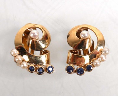 Lot 680 - A pair of 9ct yellow gold ear clips, each set...