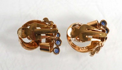 Lot 680 - A pair of 9ct yellow gold ear clips, each set...