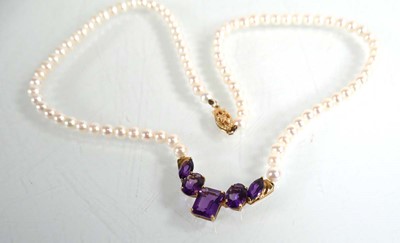 Lot 685 - A single strand cultured pearl necklace with...