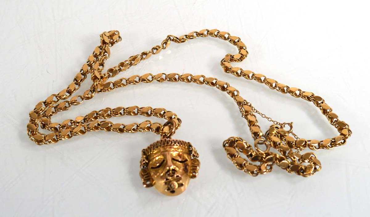 Lot 693 - A yellow metal fancy link necklace suspending...