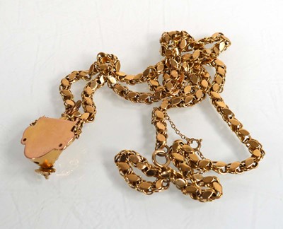 Lot 693 - A yellow metal fancy link necklace suspending...