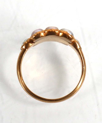 Lot 700 - An 18ct yellow gold ring set eleven small...