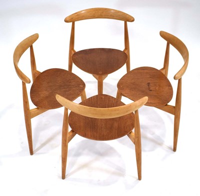 Lot 302 - A set of four 'Heart' stacking chairs with...