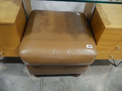 Lot 1209 - Tan leather upholstered ottoman