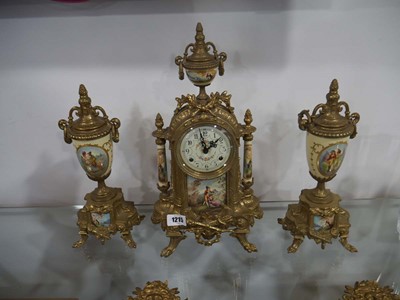 Lot 1215 - Ornate gilt mantle clock with matching pair of...